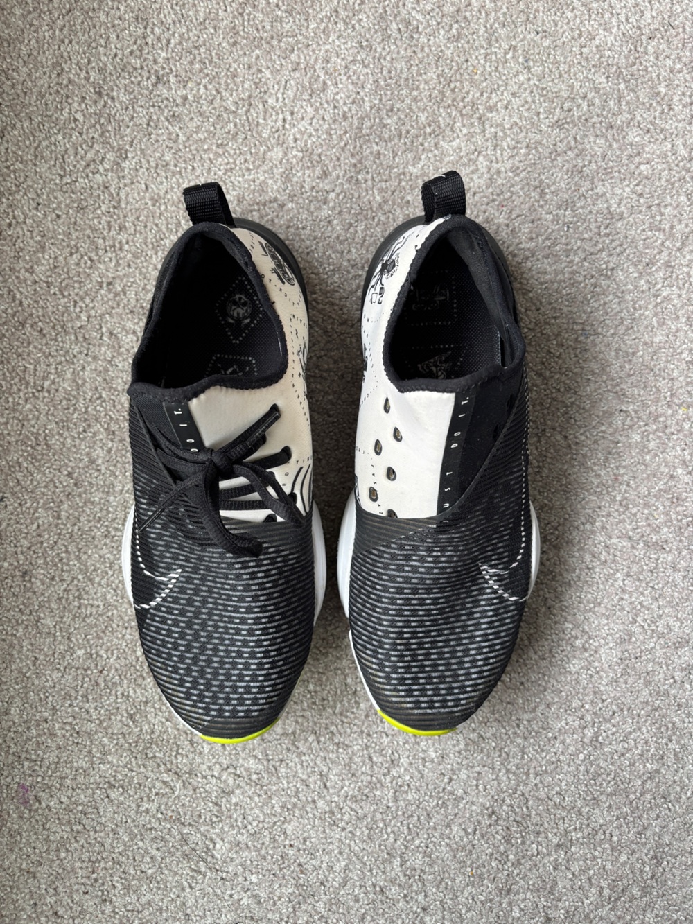 Nike Black and White Low-Top Sneakers with Neon Yellow Accent
